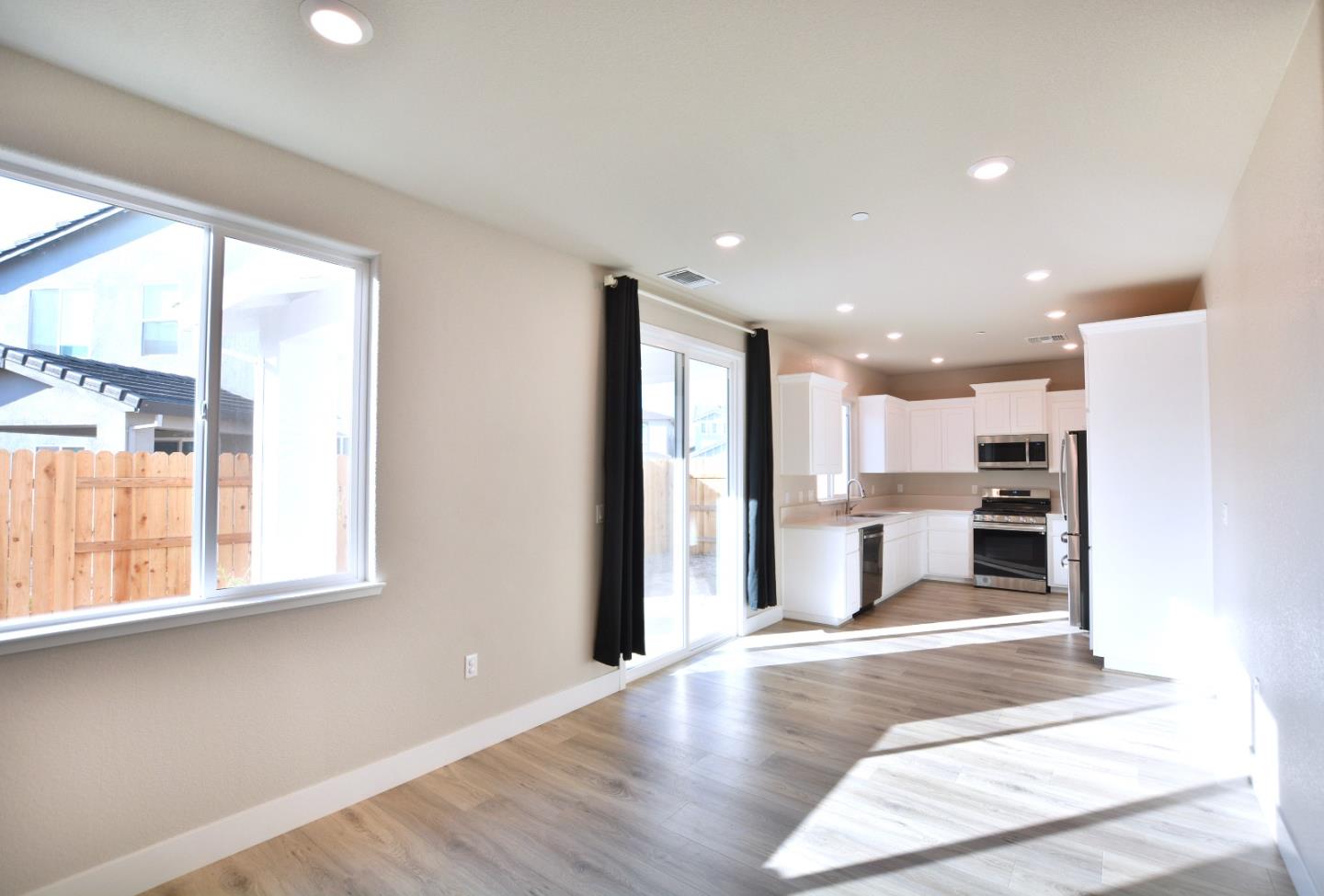 809 Big Range Way Rocklin, CA 95765 - Photo 11 of 31 a view of a kitchen with a sink and cabinets
