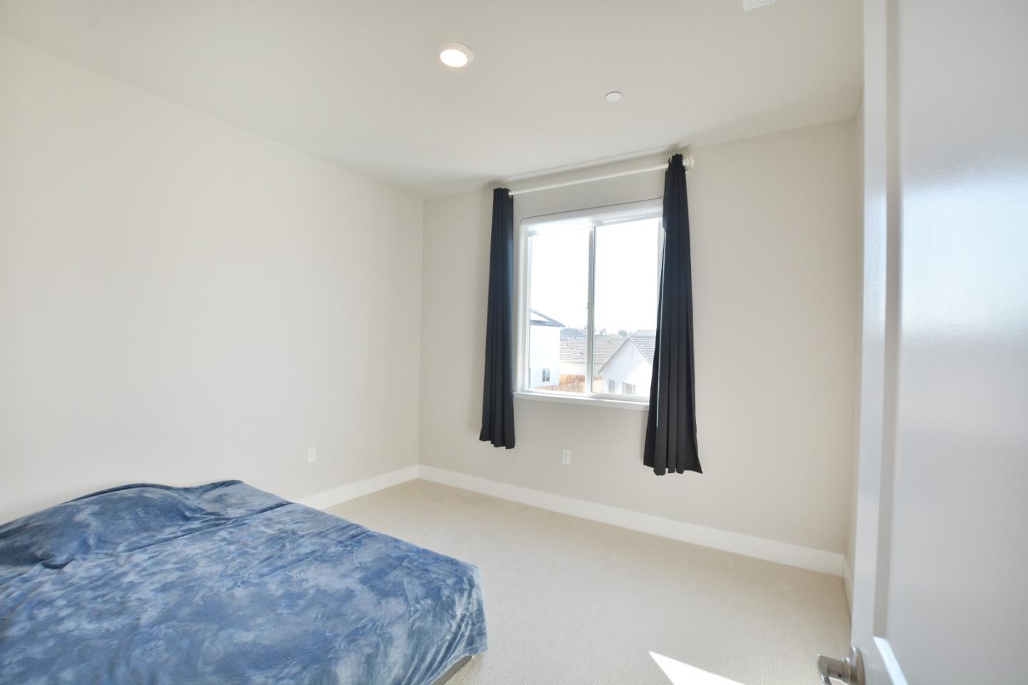 809 Big Range Way Rocklin, CA 95765 - Photo 21 of 31 a bedroom with a bed and window