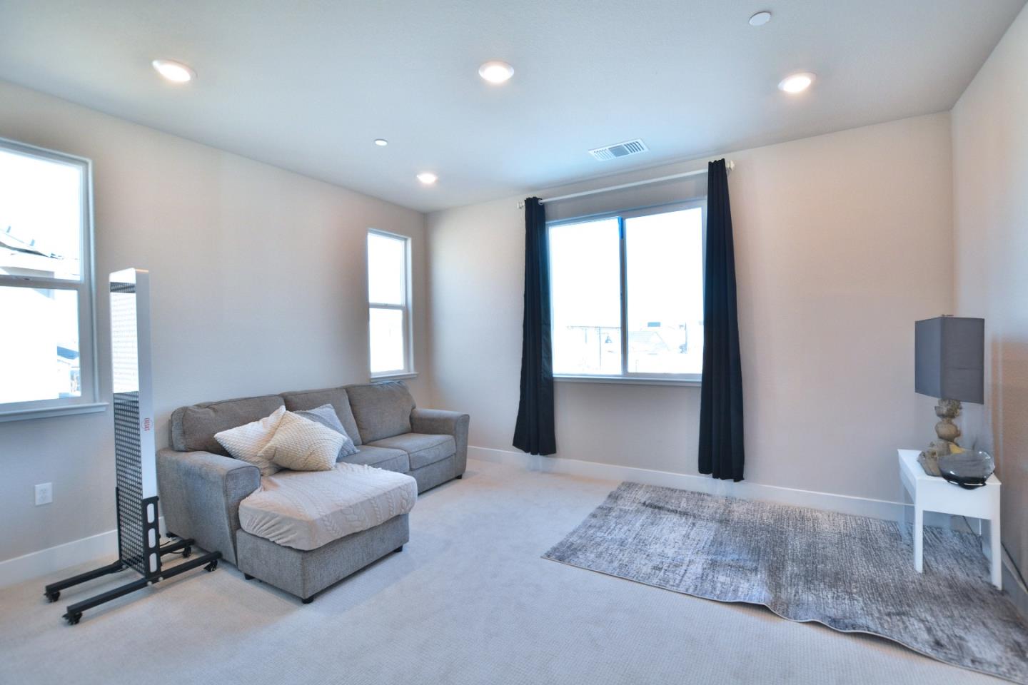 809 Big Range Way Rocklin, CA 95765 - Photo 23 of 31 a living room with furniture and a large window