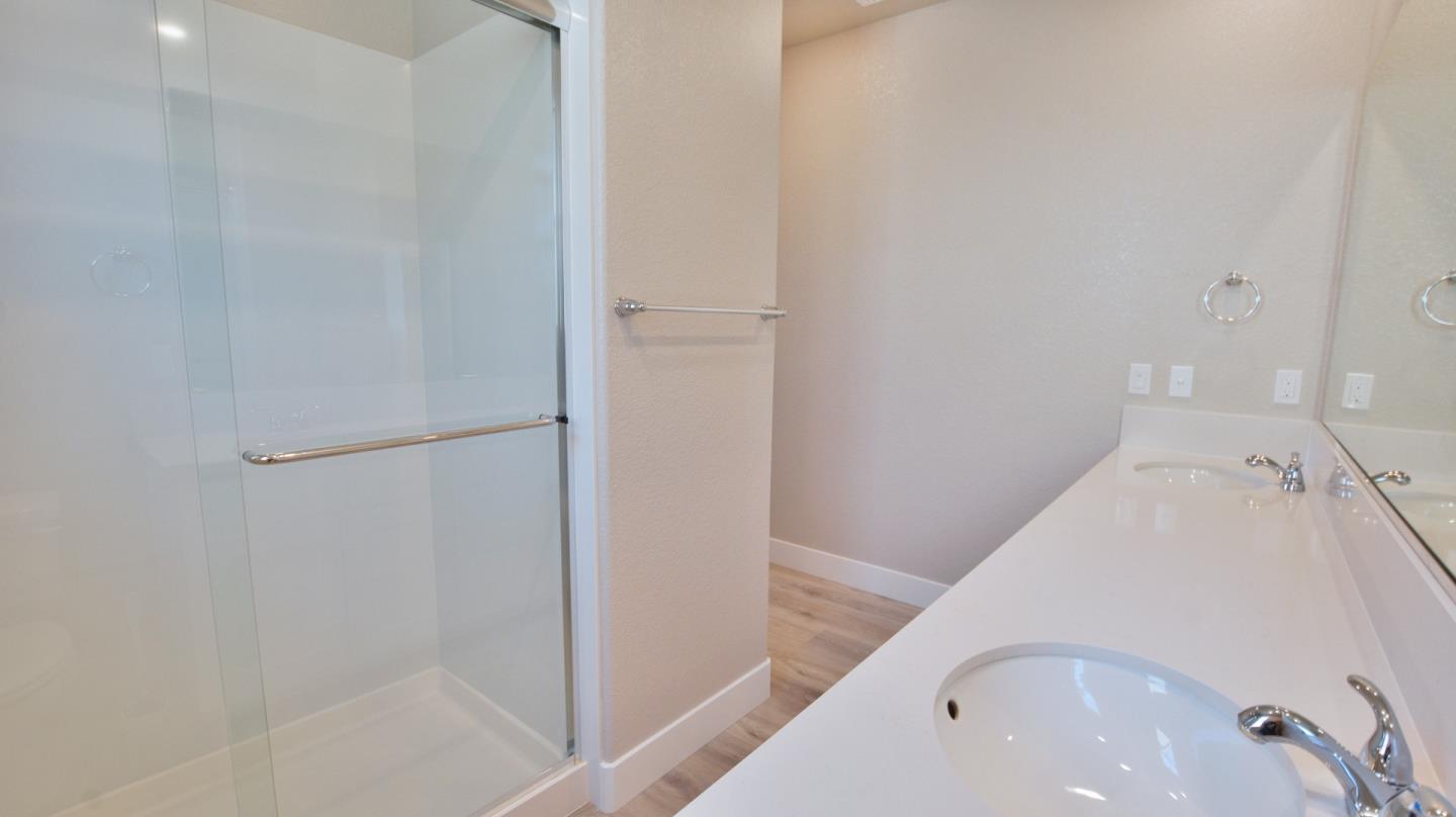 809 Big Range Way Rocklin, CA 95765 - Photo 27 of 31 a bathroom with a bathtub and a shower