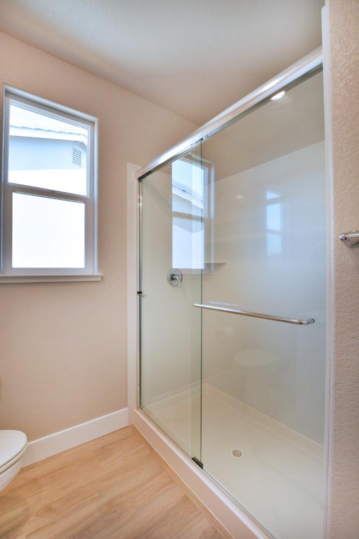 809 Big Range Way Rocklin, CA 95765 - Photo 28 of 31 a bathroom that has a glass shower door