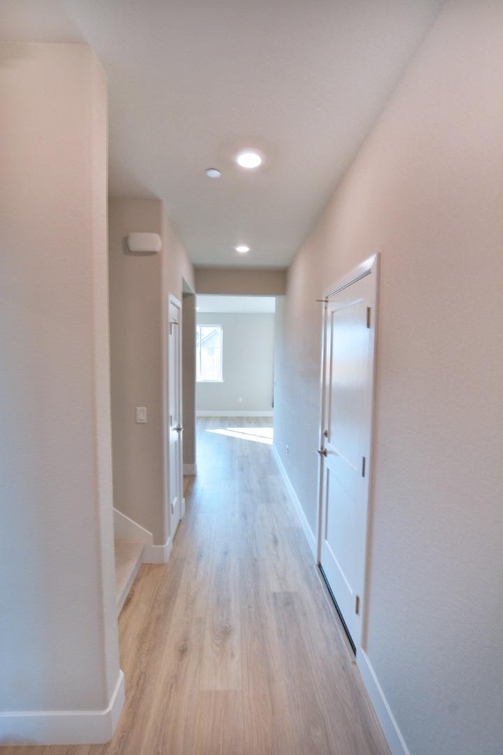 809 Big Range Way Rocklin, CA 95765 - Photo 3 of 31 a view of a hallway with wooden floor