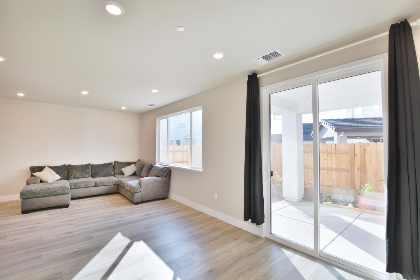 809 Big Range Way Rocklin, CA 95765 - Photo 5 of 31 a living room with furniture and a large window