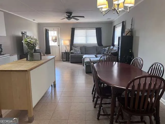 a view of a dining room with furniture