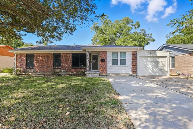 front view of a house with a patio