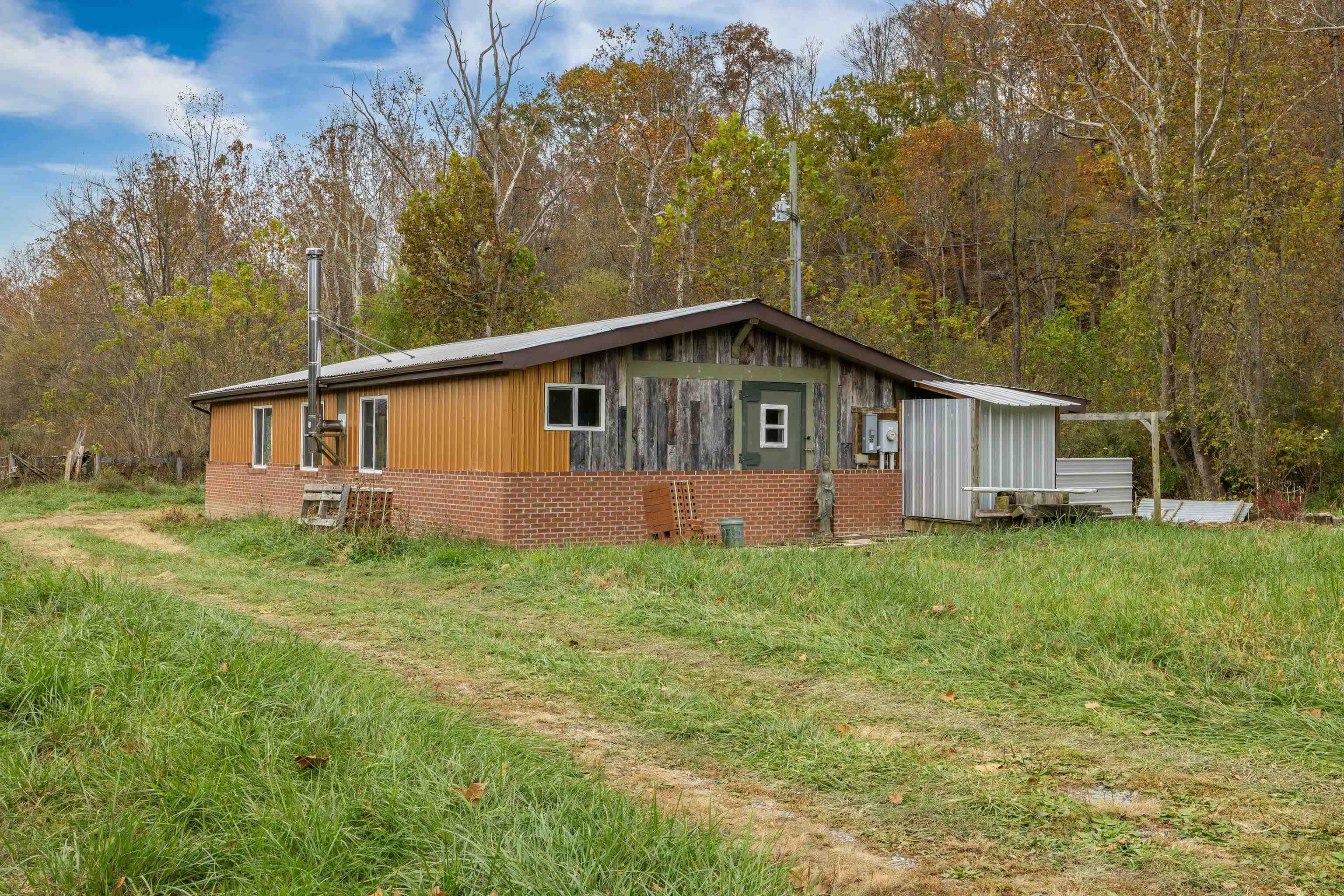 3441 West Midland Trail Lexington, VA 24450 - Photo 15 of 43 a view of a house with backyard