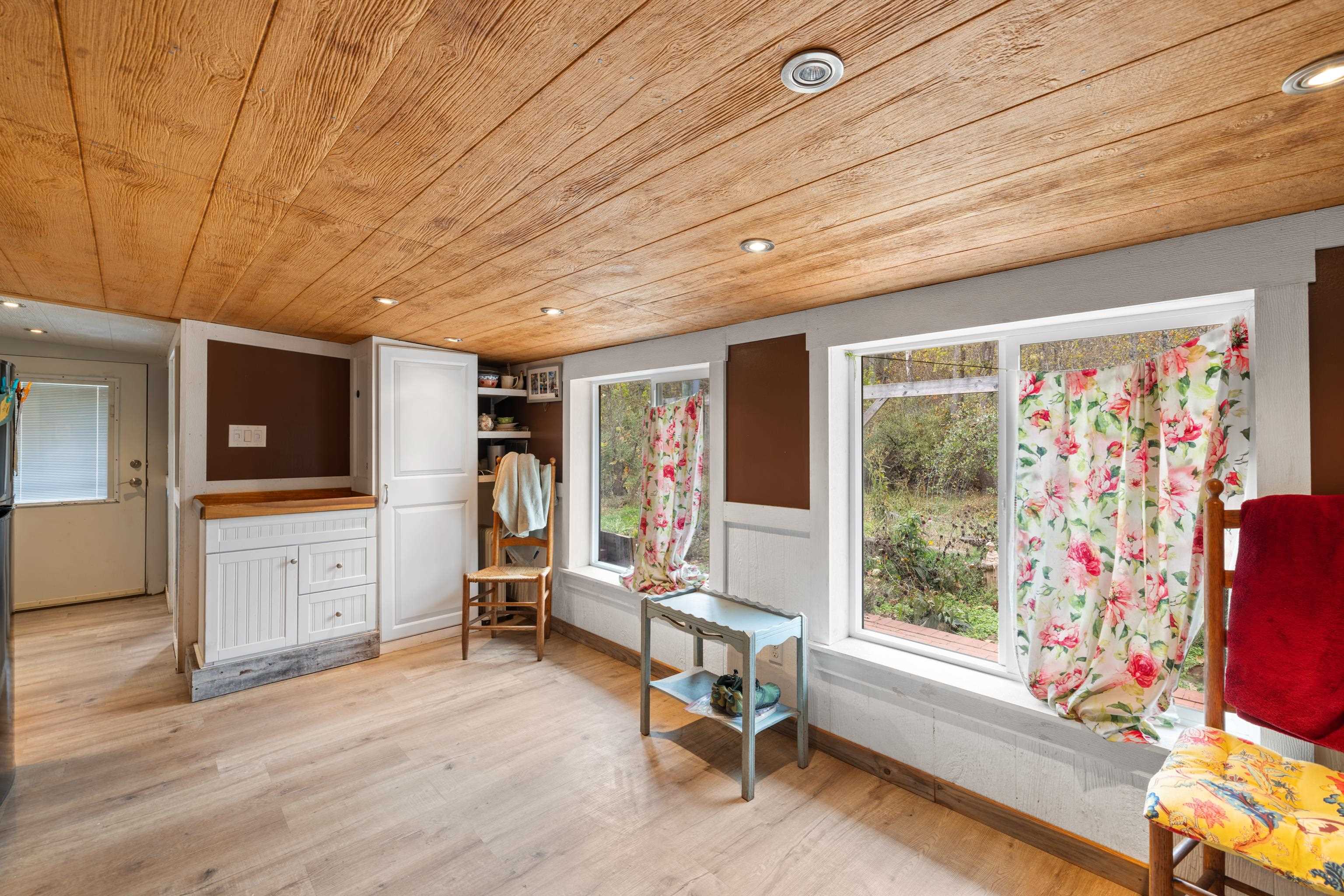 3441 West Midland Trail Lexington, VA 24450 - Photo 22 of 43 a view of a livingroom with workspace and a window
