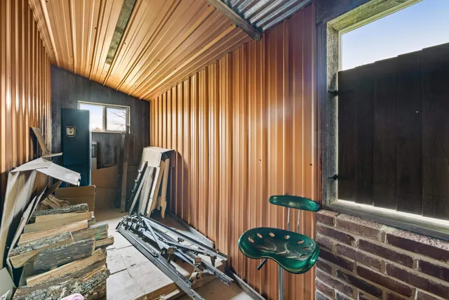 a view of a balcony with chairs