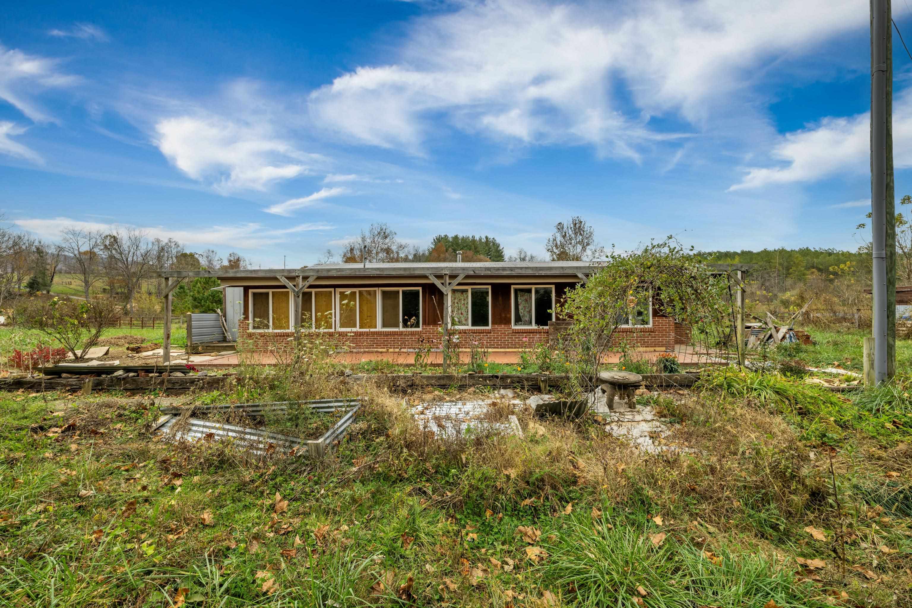 3441 West Midland Trail Lexington, VA 24450 - Photo 36 of 43 a view of a yard in front of a house