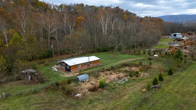 a backyard of a house with lots of green space