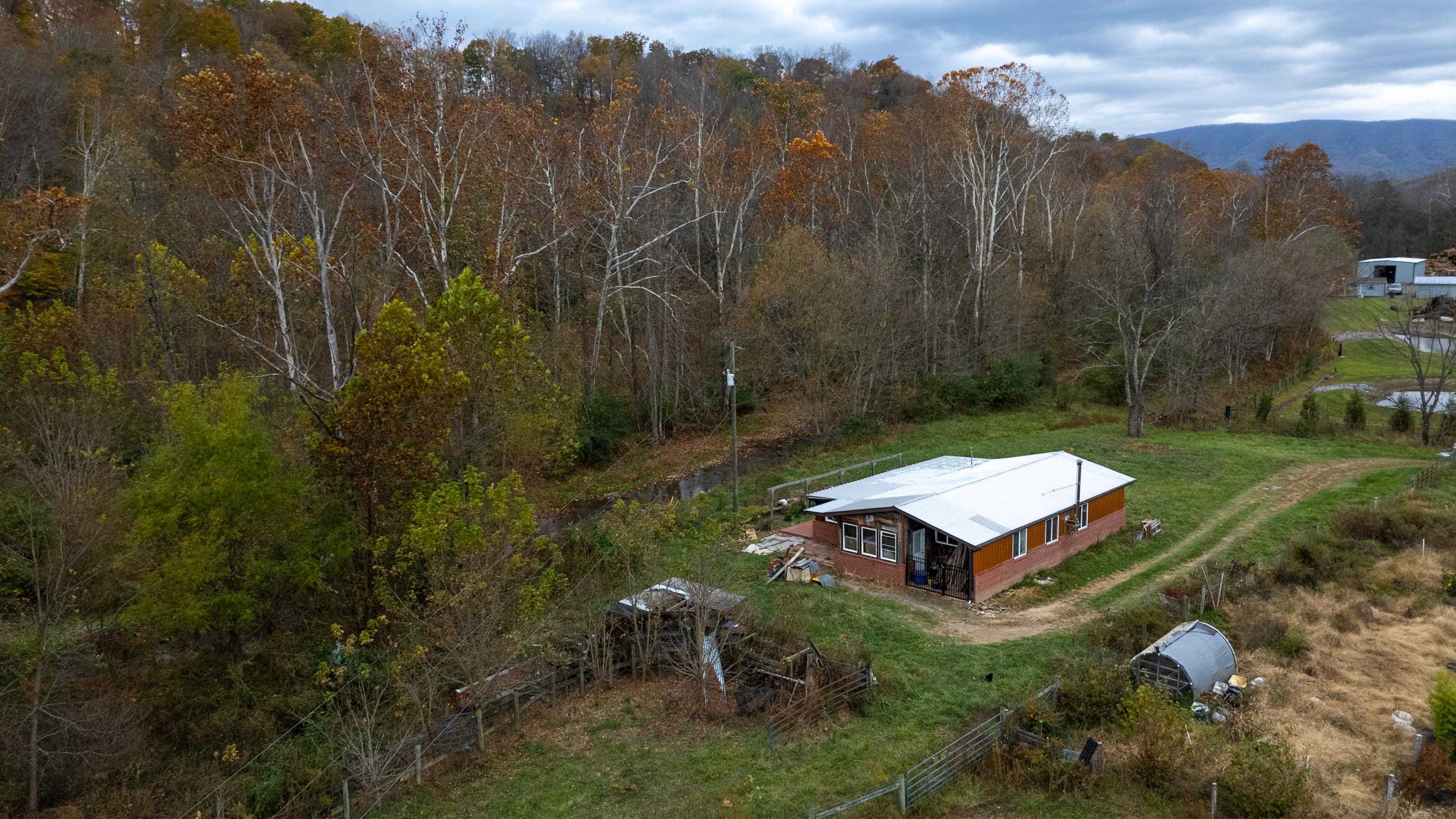 3441 West Midland Trail Lexington, VA 24450 - Photo 41 of 43 an aerial view of a house with a yard