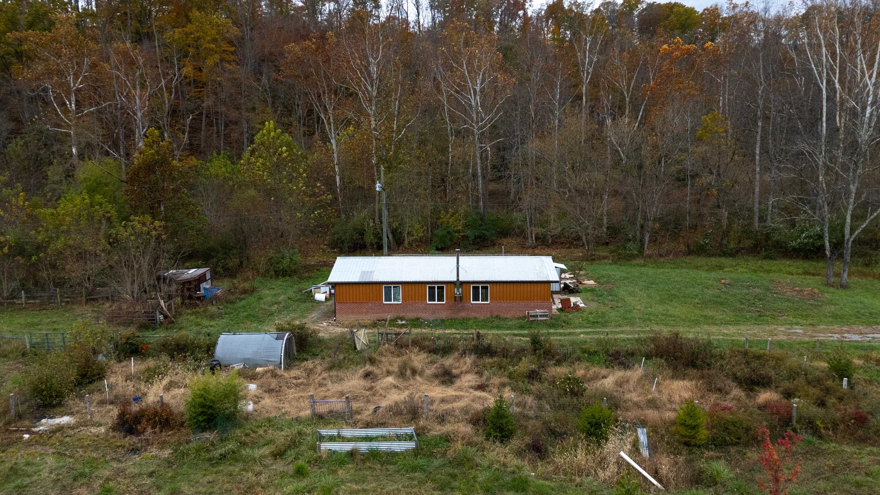 3441 West Midland Trail Lexington, VA 24450 - Photo 7 of 43 a view of a house with a yard