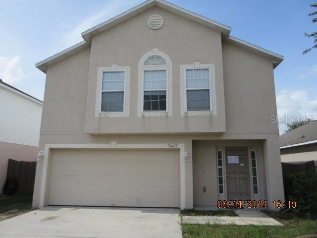 11427 Ivy Flower Loop Riverview, FL 33578 - Photo 1 of 1 a front view of a house with garden