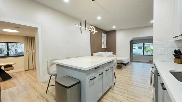 a bedroom with a bed and a table