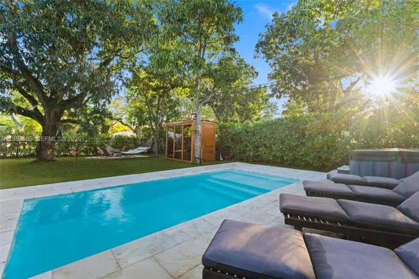 a view of yard with patio