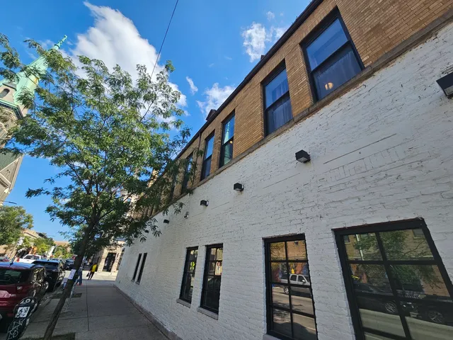 a front view of building with outdoor space