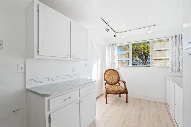 a kitchen with stainless steel appliances granite countertop a stove and a refrigerator