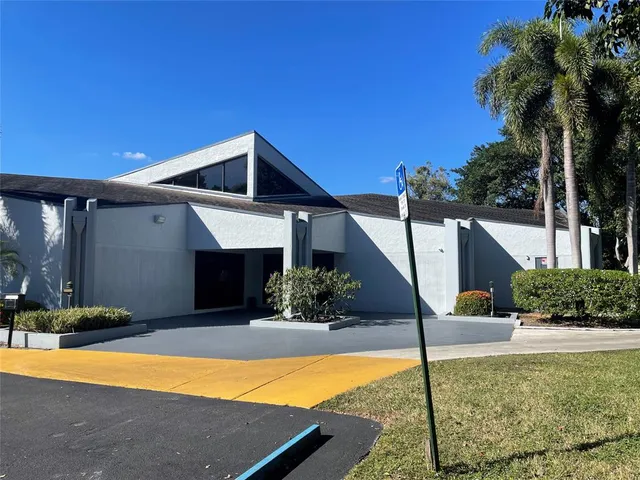 a group of people sitting at living room