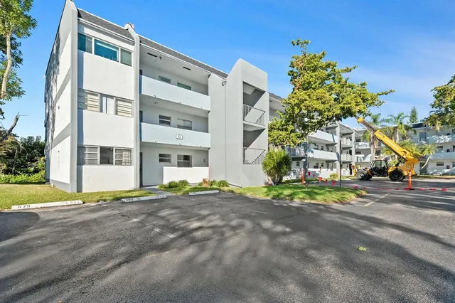 a view of a building with a street