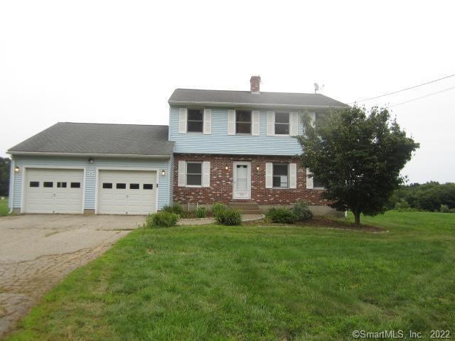 599 Westchester Road Colchester, CT 06415 - Photo 1 of 1 a front view of a house with a yard