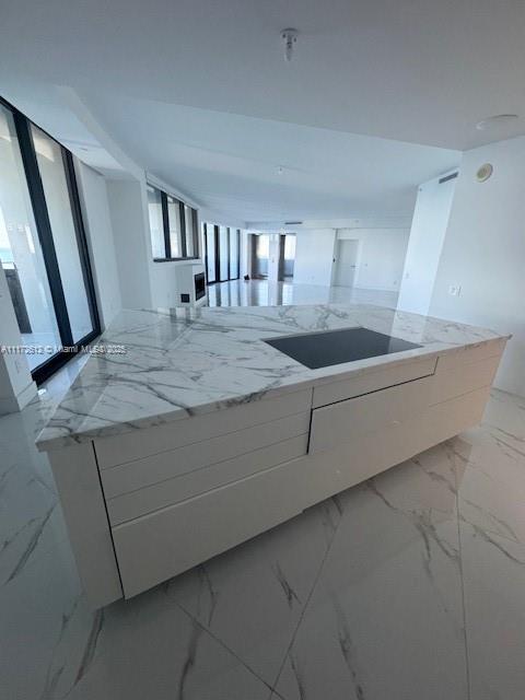 18555 Collins Avenue, Unit 2905 Sunny Isles Beach, FL 33160 - Photo 20 of 40 a bathroom with a sink and a mirror