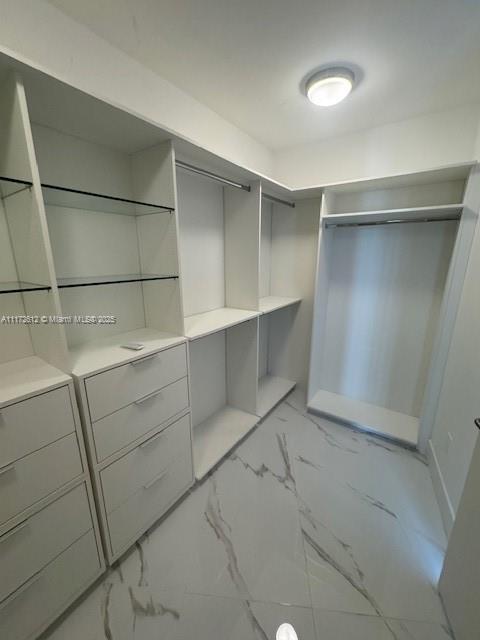 18555 Collins Avenue, Unit 2905 Sunny Isles Beach, FL 33160 - Photo 28 of 40 a room with cabinets