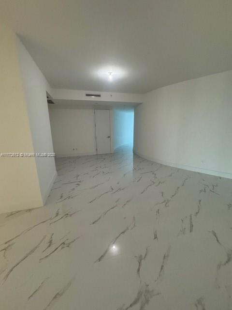 18555 Collins Avenue, Unit 2905 Sunny Isles Beach, FL 33160 - Photo 38 of 40 an empty room with a empty space