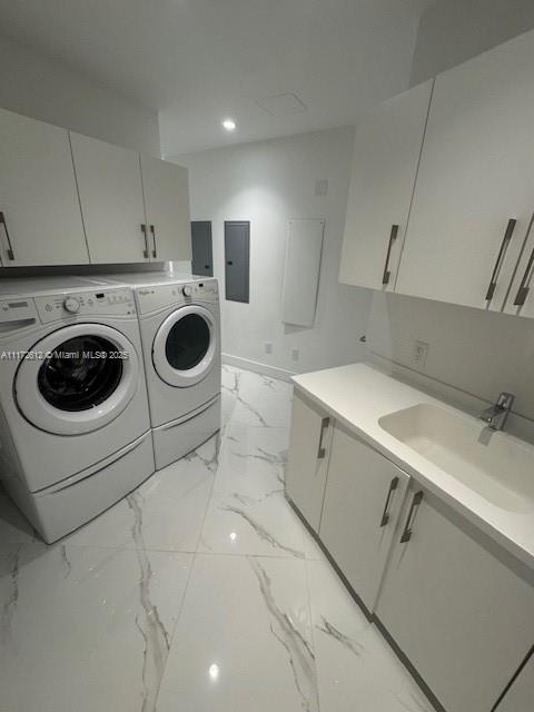 18555 Collins Avenue, Unit 2905 Sunny Isles Beach, FL 33160 - Photo 39 of 40 a utility room with sink dryer and washer