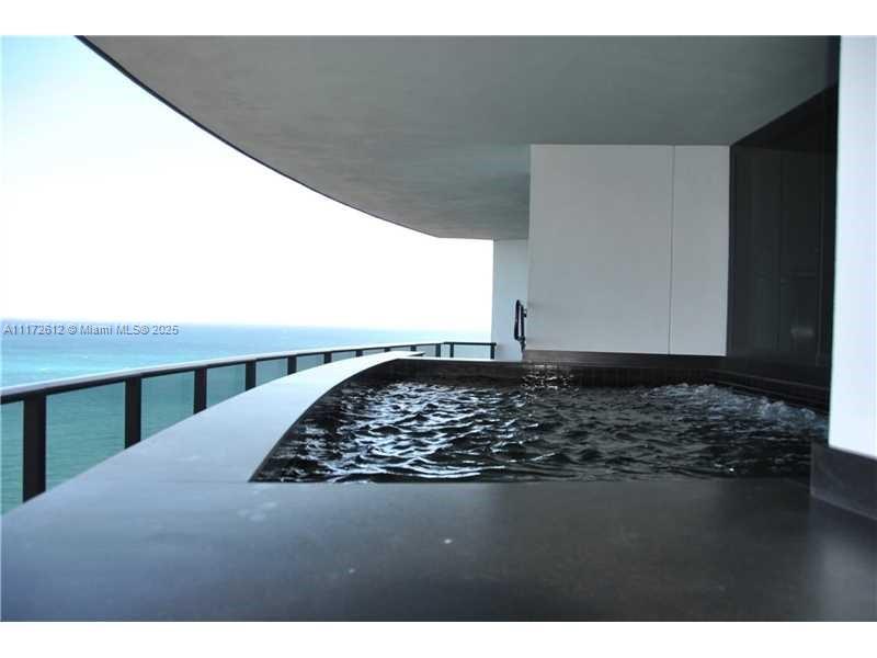 18555 Collins Avenue, Unit 2905 Sunny Isles Beach, FL 33160 - Photo 6 of 40 a view of wooden floor