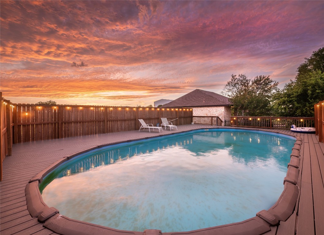 1822 Rowe Loop Pflugerville, TX 78660 - Photo 31 of 40 a view of a swimming pool with a lake view