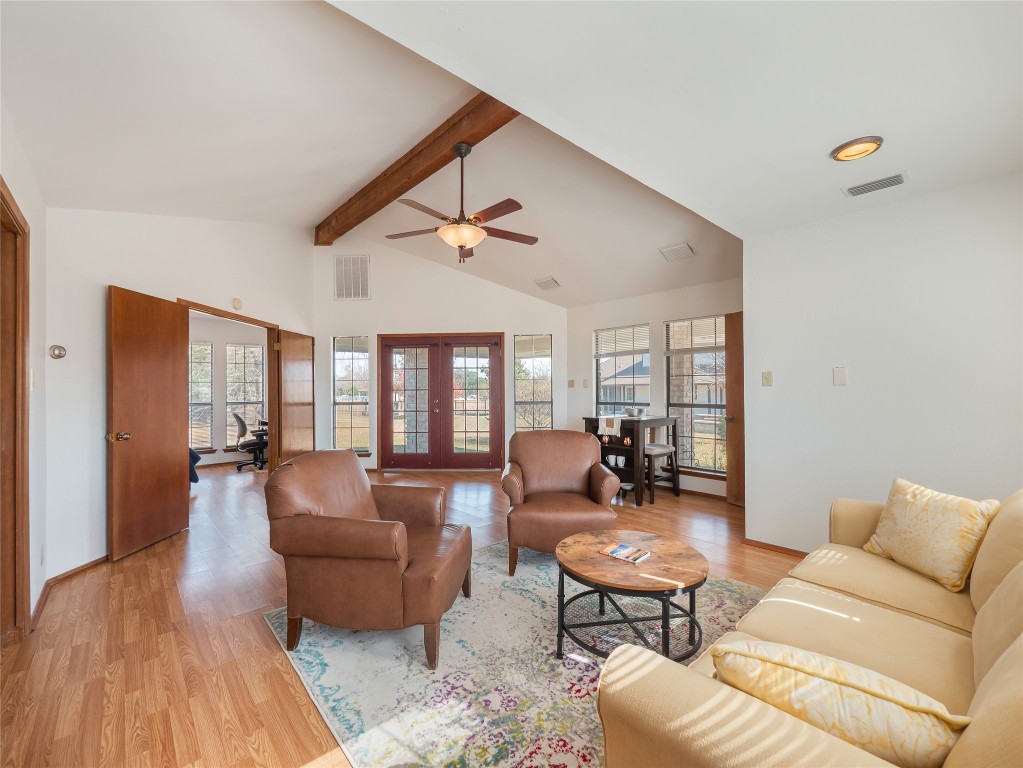 1822 Rowe Loop Pflugerville, TX 78660 - Photo 34 of 40 a living room with furniture and wooden floor