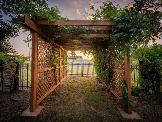 a view of backyard with green space