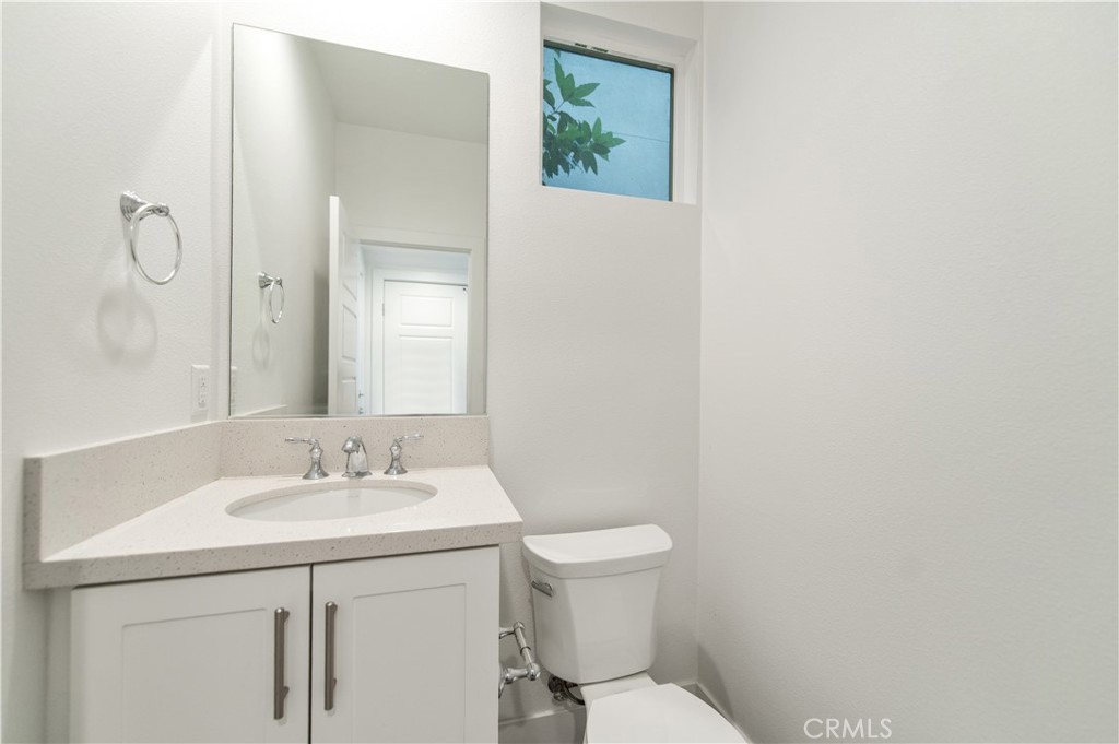 26380 Paseo Sillin San Juan Capistrano, CA 92675 - Photo 16 of 49 a bathroom with a sink toilet and vanity