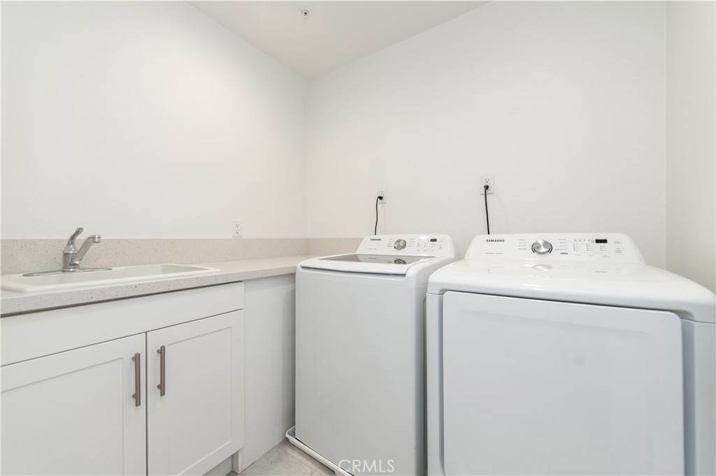 26380 Paseo Sillin San Juan Capistrano, CA 92675 - Photo 26 of 49 a utility room with dryer and washer