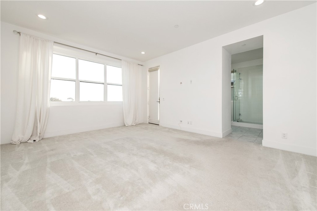 26380 Paseo Sillin San Juan Capistrano, CA 92675 - Photo 27 of 49 an empty room with windows