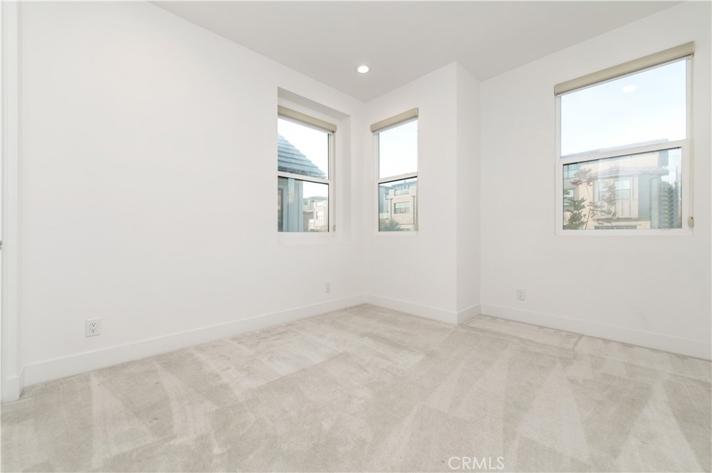 26380 Paseo Sillin San Juan Capistrano, CA 92675 - Photo 36 of 49 an empty room with windows