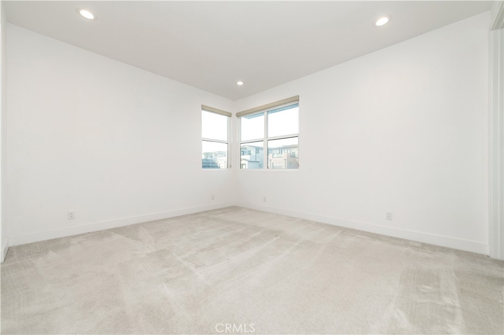 26380 Paseo Sillin San Juan Capistrano, CA 92675 - Photo 42 of 49 an empty room with windows