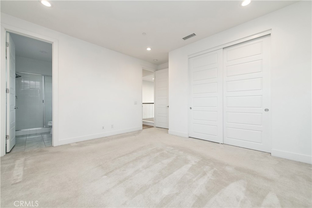 26380 Paseo Sillin San Juan Capistrano, CA 92675 - Photo 43 of 49 an empty room with white cabinet and windows