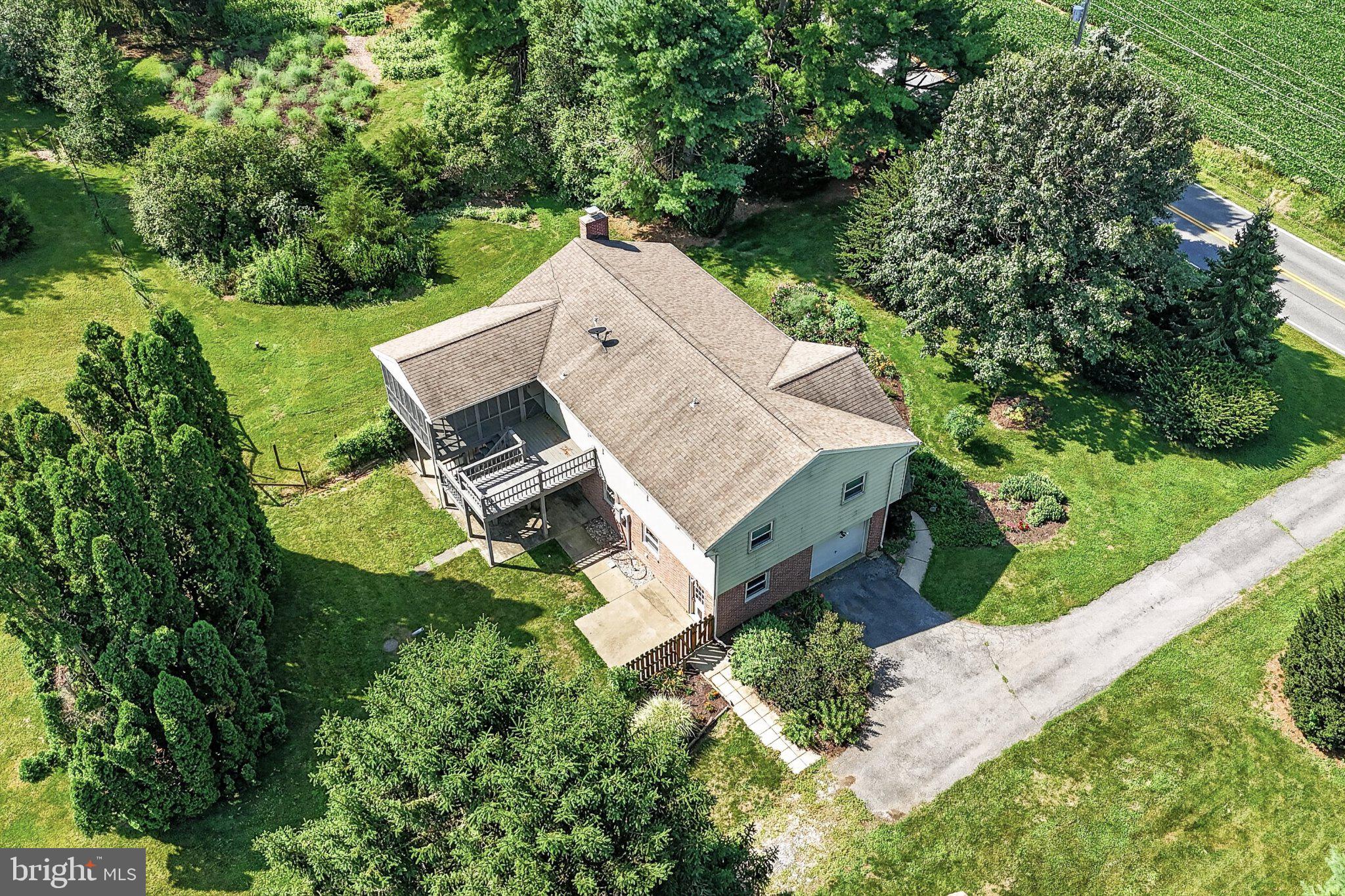 1277 South Colebrook Road Manheim, PA 17545 - Photo 57 of 65 Charming home amidst lush greenery.