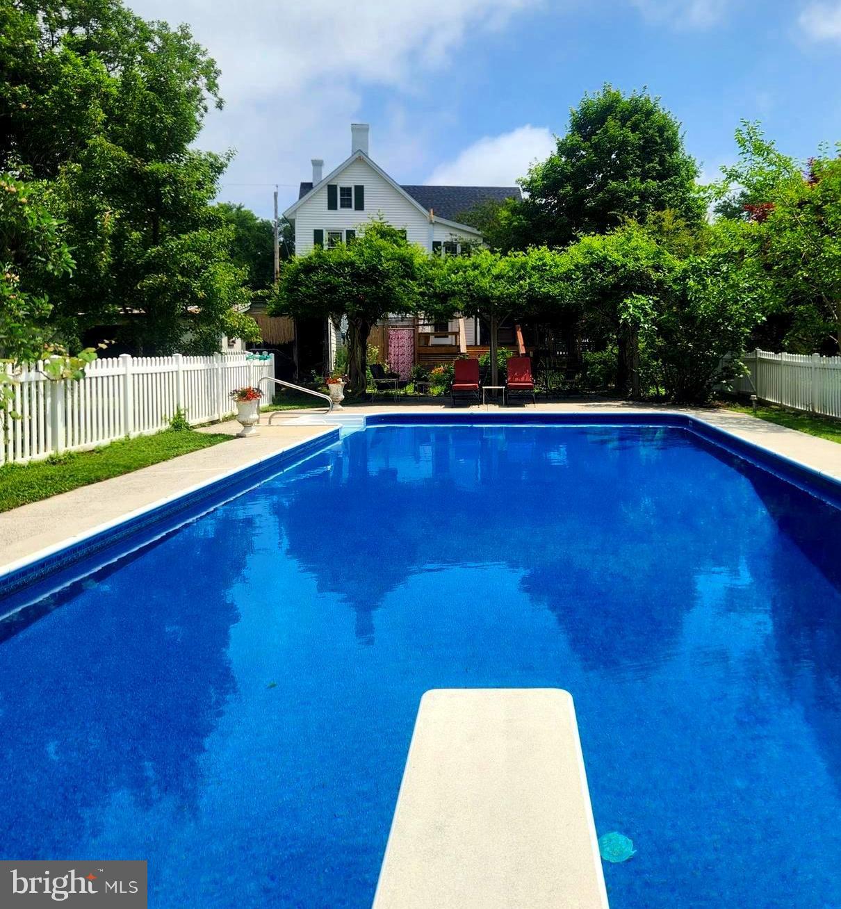 101 Washington Street Berlin, MD 21811 - Photo 13 of 22 a view of a balcony with two chairs