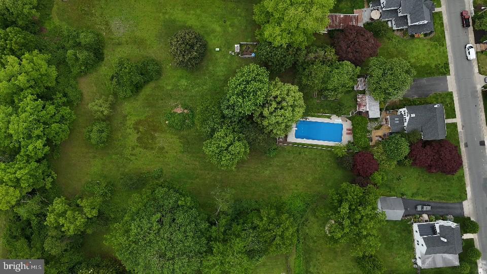 101 Washington Street Berlin, MD 21811 - Photo 19 of 22 an aerial view of residential house with outdoor space and trees all around