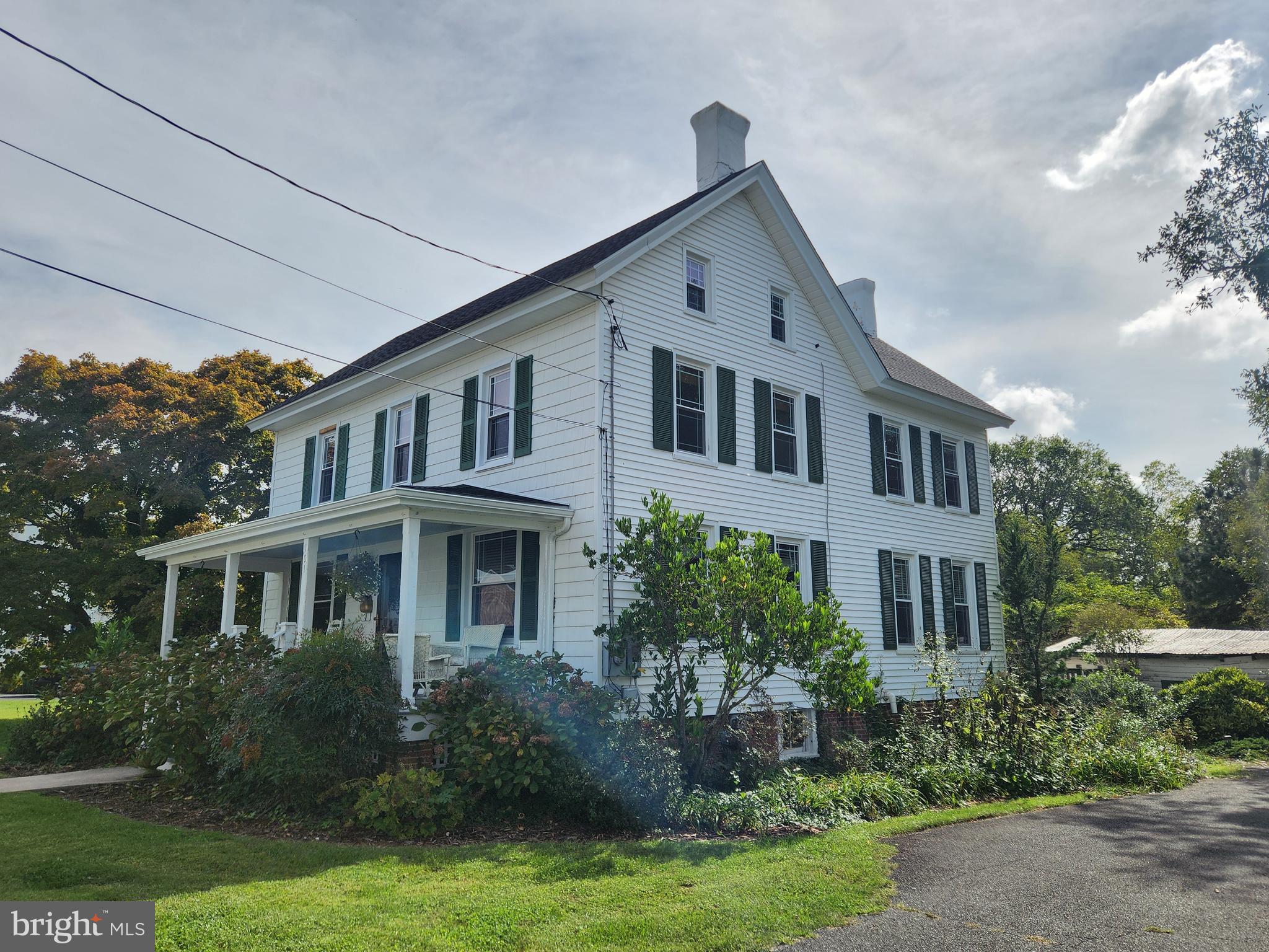 101 Washington Street Berlin, MD 21811 - Photo 21 of 22 a front view of a house with garden
