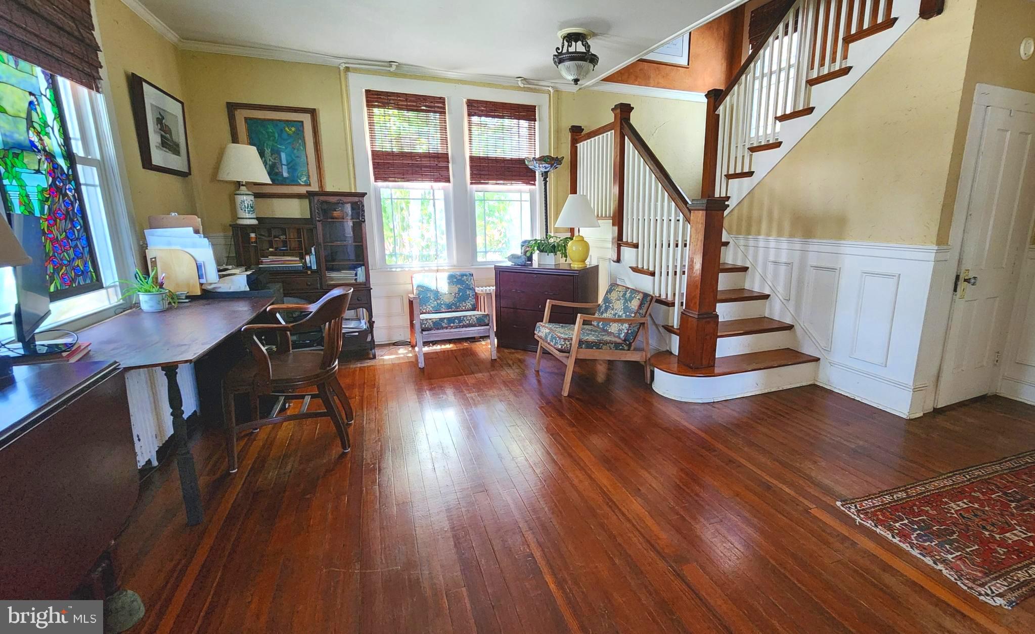 101 Washington Street Berlin, MD 21811 - Photo 3 of 22 a view of entryway livingroom and hall with wooden floor