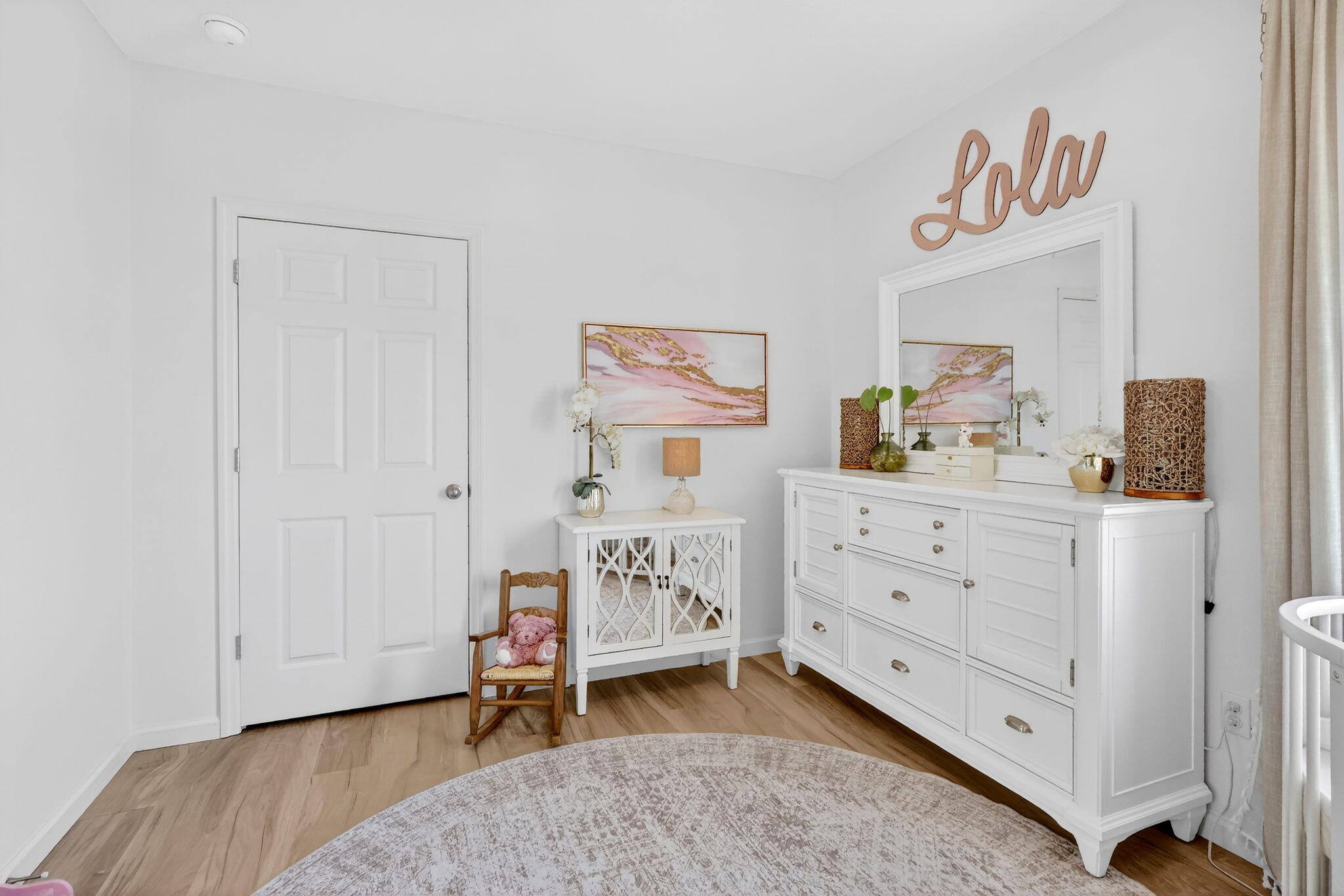 10897 Pacini Way Port St. Lucie, FL 34987 - Photo 19 of 35 a bedroom with a baby bed a desk and chair