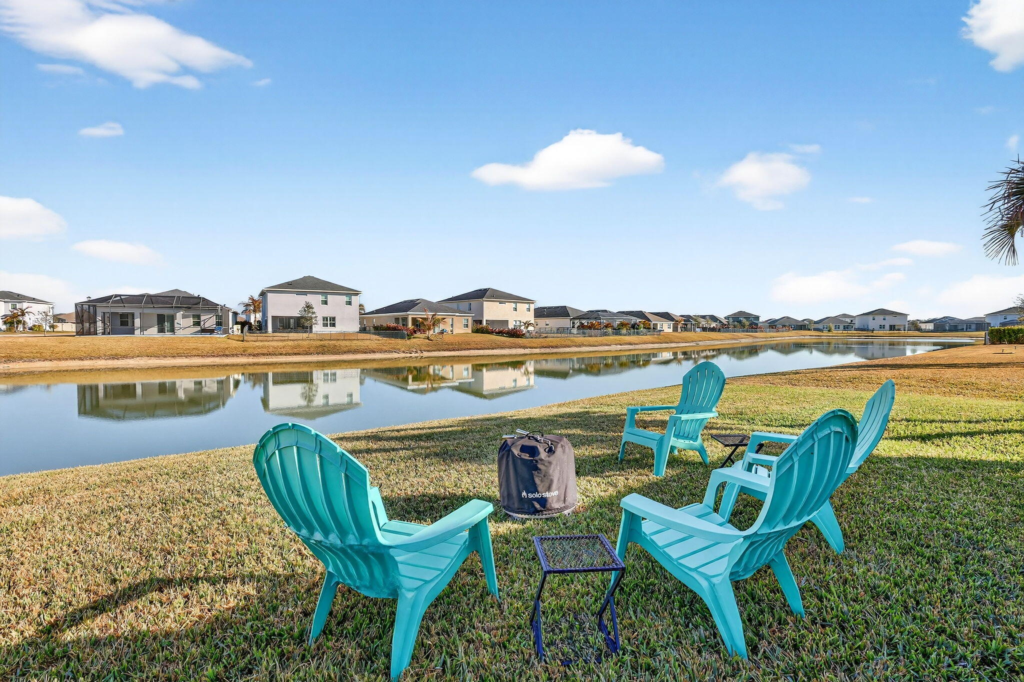10897 Pacini Way Port St. Lucie, FL 34987 - Photo 24 of 35 a view of swimming pool with outdoor seating and plants