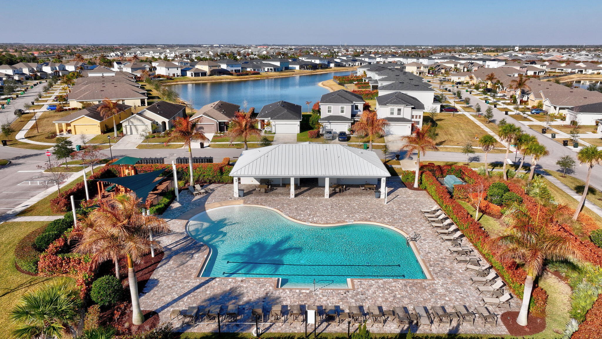 10897 Pacini Way Port St. Lucie, FL 34987 - Photo 31 of 35 an aerial view of a house with a garden
