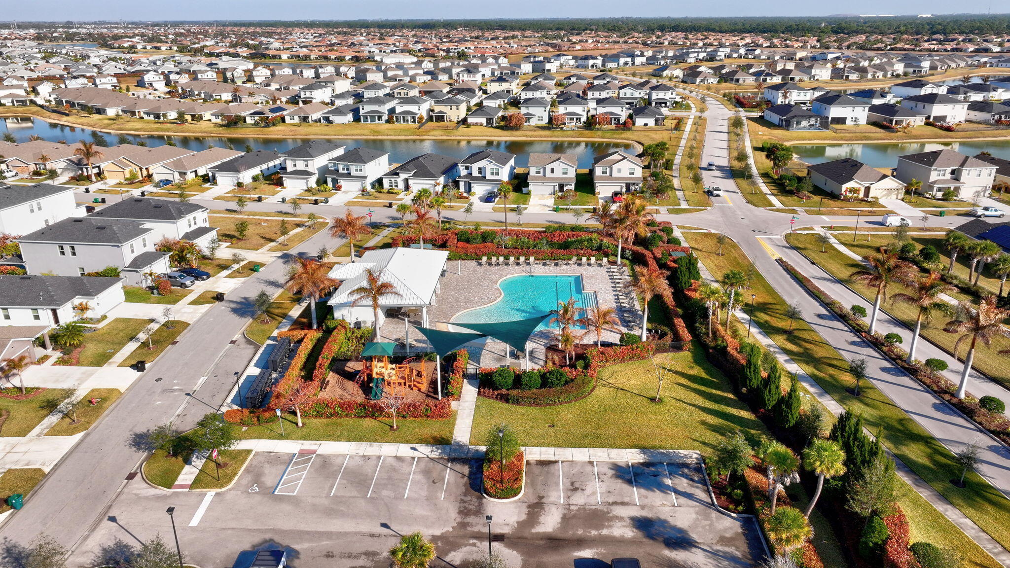 10897 Pacini Way Port St. Lucie, FL 34987 - Photo 33 of 35 an aerial view of residential houses with outdoor space