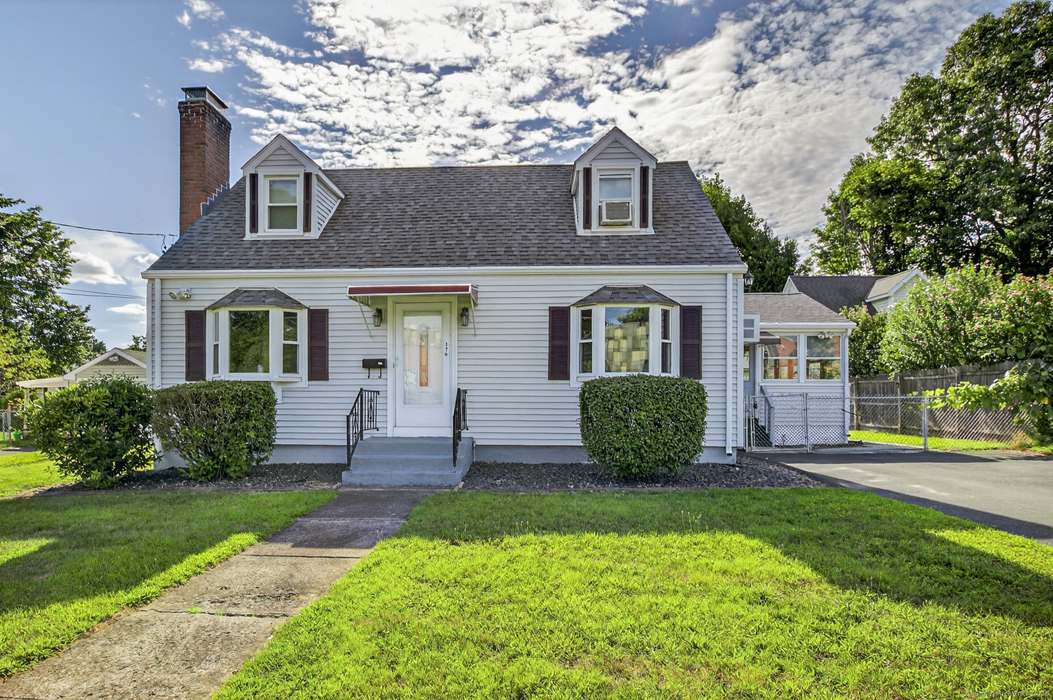 176 Broad Street Manchester, CT 06042 - Photo 1 of 1 front view of a house with a yard