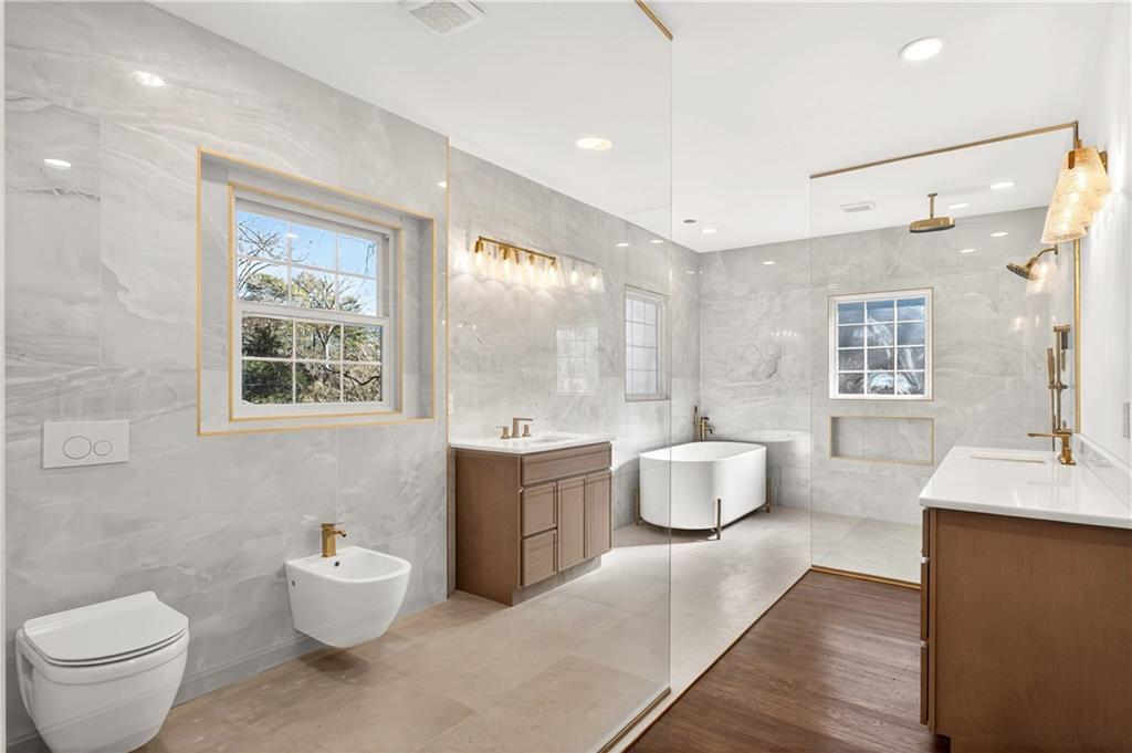 1330 West Wesley Road Northwest Atlanta, GA 30327 - Photo 18 of 46 a bathroom with a granite countertop sink mirror and toilet
