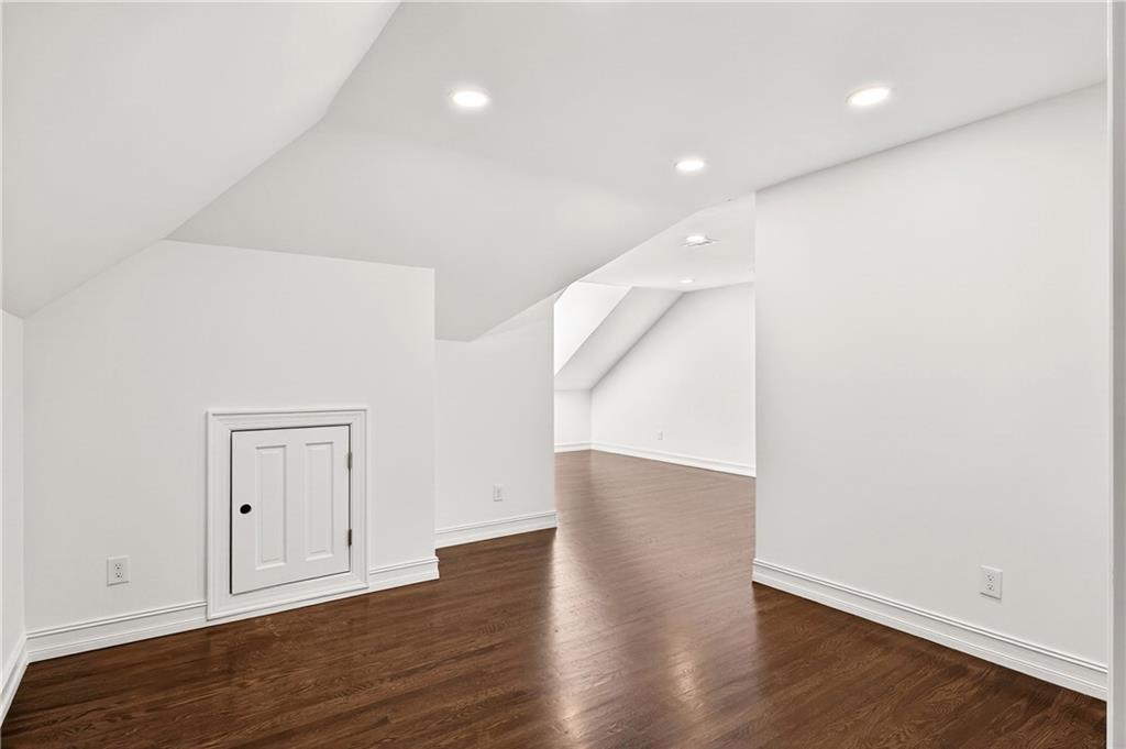 1330 West Wesley Road Northwest Atlanta, GA 30327 - Photo 25 of 46 wooden floor in an empty room with wooden floor